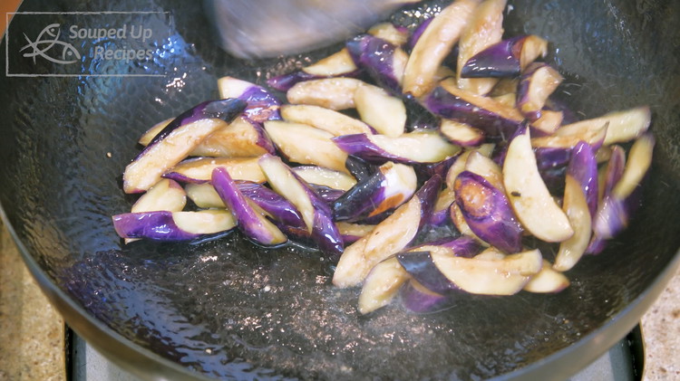 Image of Cook the skin side for 30 seconds the stir the eggplant for 1-2 minutes or until the eggplant is soft and tender.