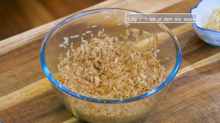 Image of Combine the leftover rice, 1 tbsp of fish sauce, and 1 tsp of dark soy sauce into a big mixing bowl and mix until you don't see the white color. If you are using noodles, please pre-boil them until al...