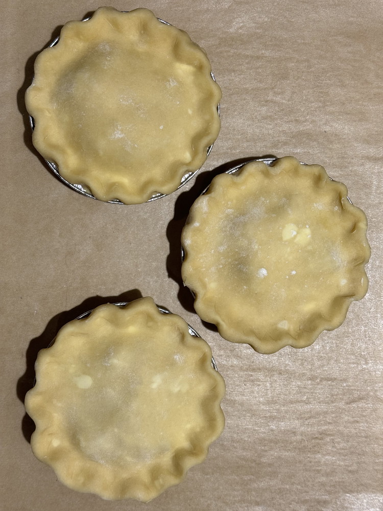 Image of Cut the rough edges off the dough and crimp your edges