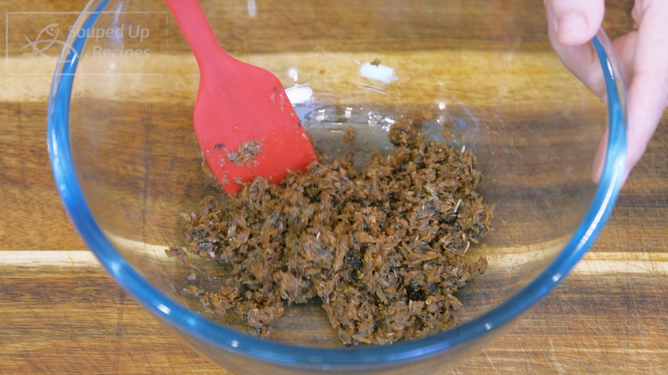 Image of Add half a can of the fried dace to a blender along with 2 tsp fermented black beans. Blend until fine and place it into a big mixing bowl.