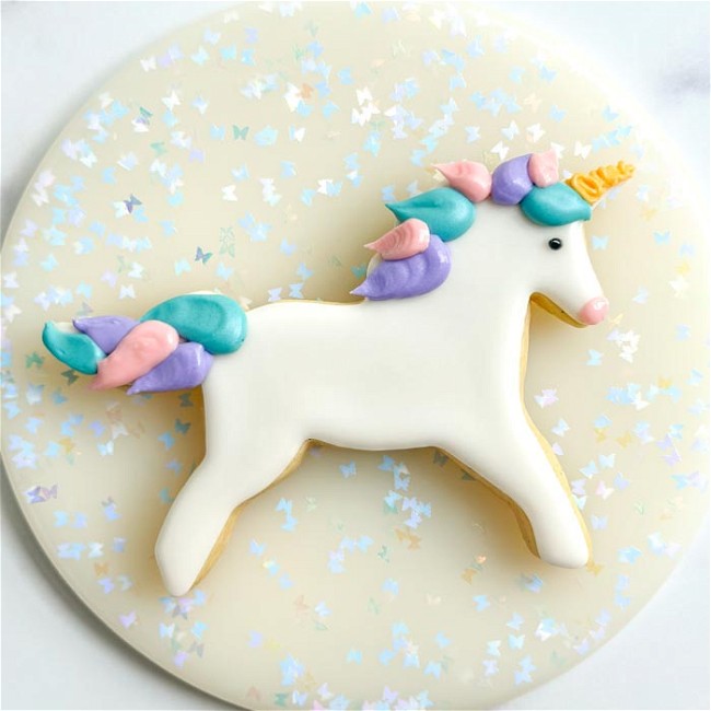 Image of How to Decorate a Jumping Unicorn Cookie with Royal Icing