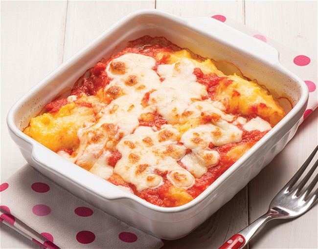 Image of Prosciutto Parmesan Polenta with Puttanesca Sauce