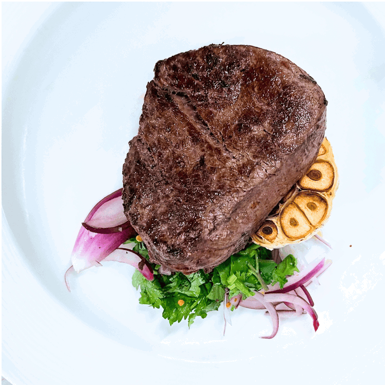 Image of This method should give you a beautifully seared med-rare bison filet with the rich flavors of butter and garlic. Enjoy your meal!