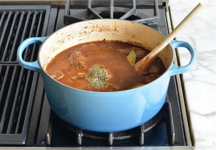 Image of Make the stew: Melt butter in a large pot over...