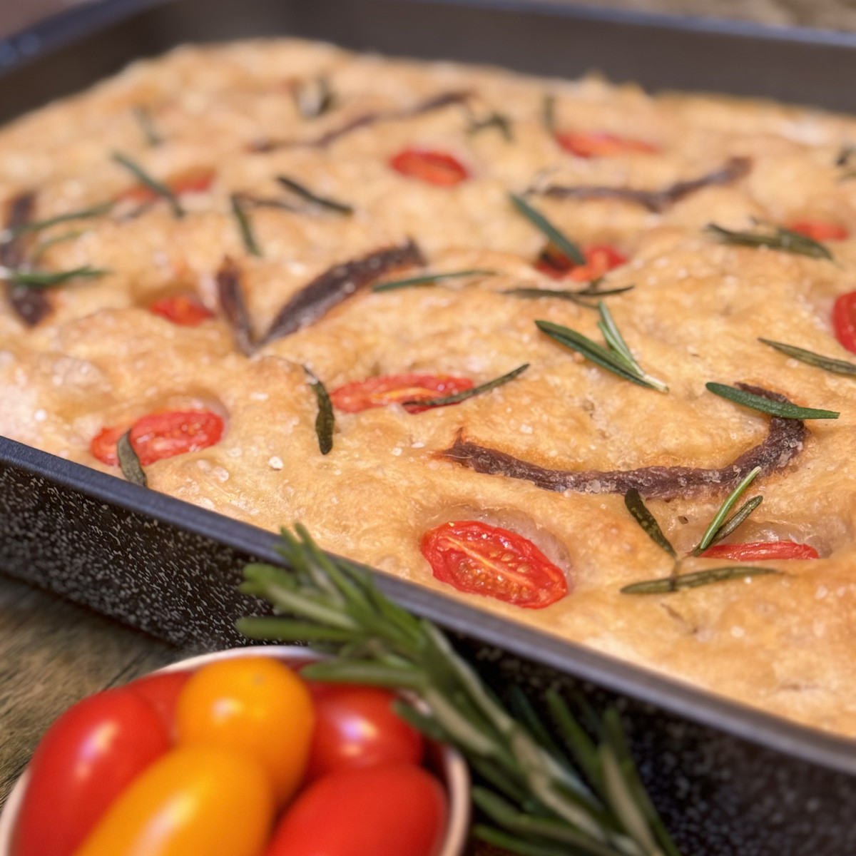 Focaccia with tomatoes and anchovy
