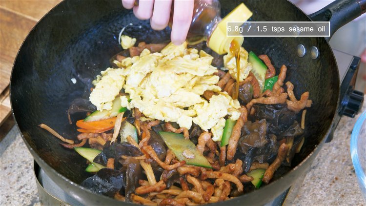Image of Introduce the egg back into the wok along with a...