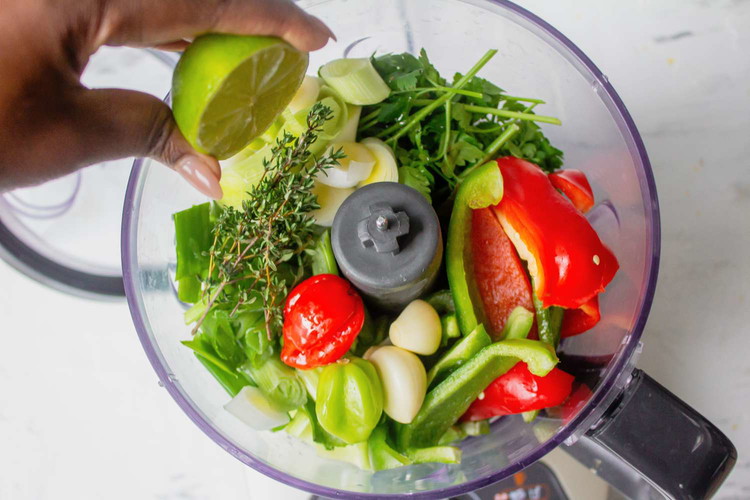 Image of To prepare marinade and meat: In a blender or food processor, combine celery, garlic, habanero, scallion, onion, green, yellow and red bell peppers, parsley, lime juice, 2 tablespoons oil, 1/4 teaspoon salt and 1/4 cup water. Blend or process until mostly...