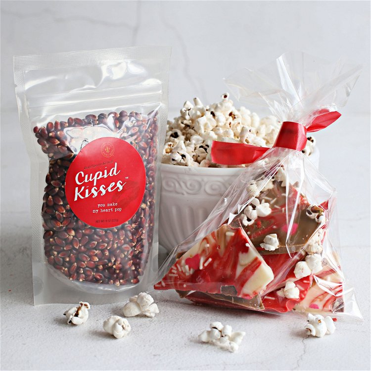 Image of Sprinkle on the popcorn, M&M candies and Valentine’s sprinkles. Refrigerate...