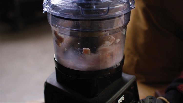 Image of Dice the bacon and place in the food processor attachment...