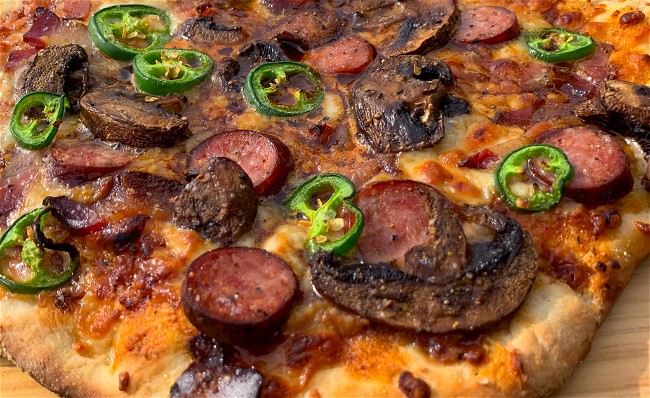 Image of Mushroom, Bacon, Sweet & Savory Sausage Pizza