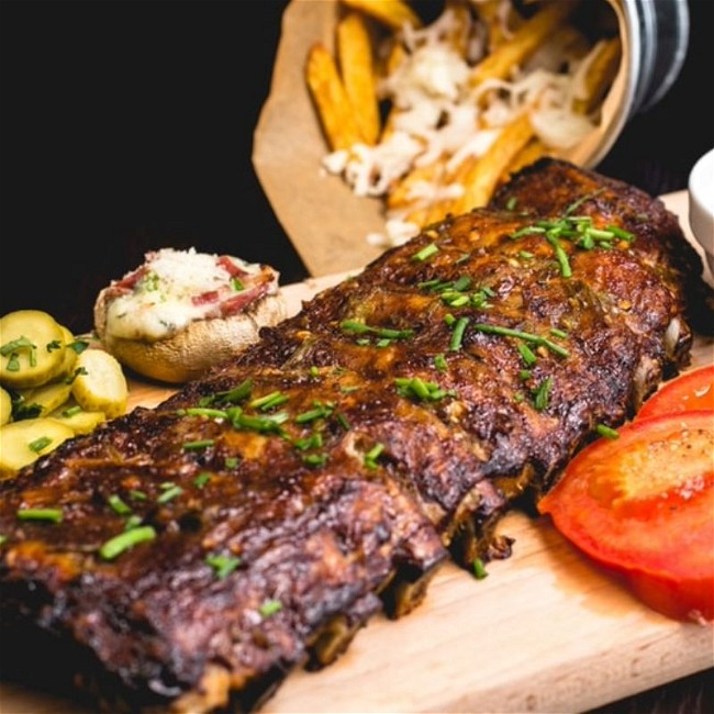 Image of Baby Back Rib Recipe Cooked in Outdoor Wood Fired Oven
