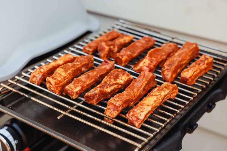 Image of Season or marinade your ribs with your desired flavours and/or rub and let them sit for 45 minutes (use this time to allow them to come up to room temperature)