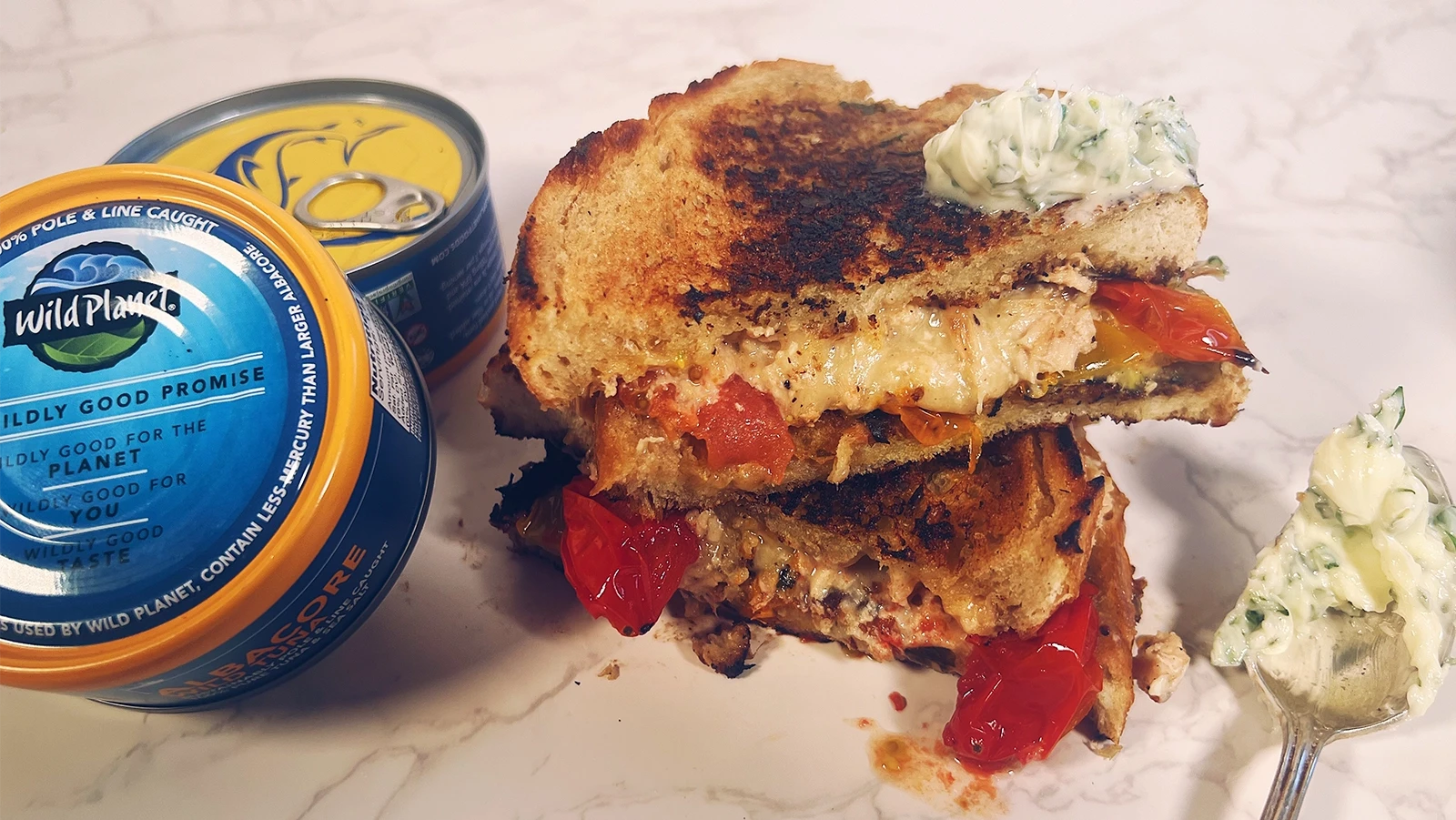 Image of Herbed Butter, Blistered Tomato, Tuna & White Cheddar Toasty