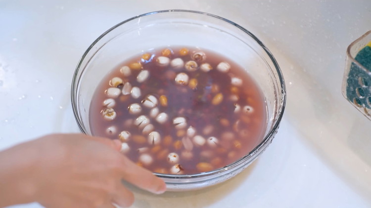 Image of Soak all the ingredients in the fridge overnight, except the red jujube and sugar.