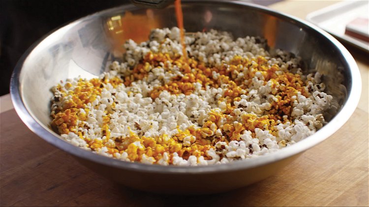 Image of Transfer your popped corn to a large bowl. Pour the...