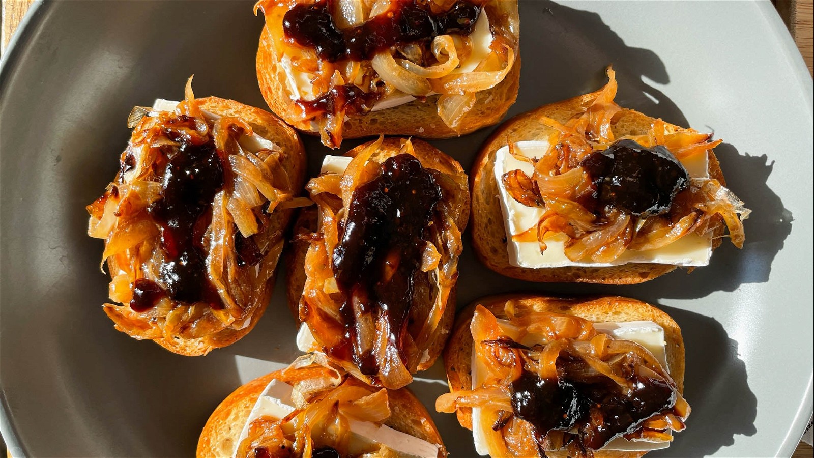 Image of Brie and Fig Crostini with Caramelized Onions Recipe