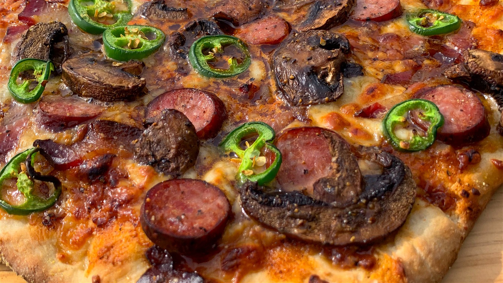 Image of Mushroom, Bacon, and Sweet & Savory Sausage Pizza