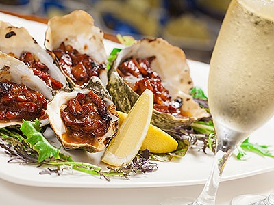 Image of Baked Oysters with Crispy Pancetta-Tomato-Basil Mignonette