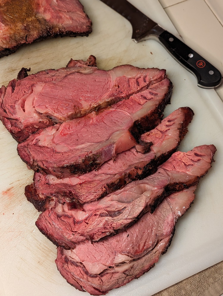 Image of Once seared, allow the roast to rest for a few minutes before slicing off the bone and slicing into portions.