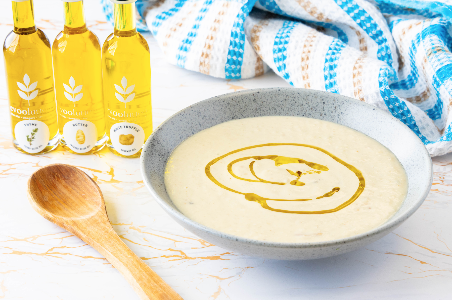 Image of Truffled Cauliflower Soup with Thyme and Butter Olive Oils 