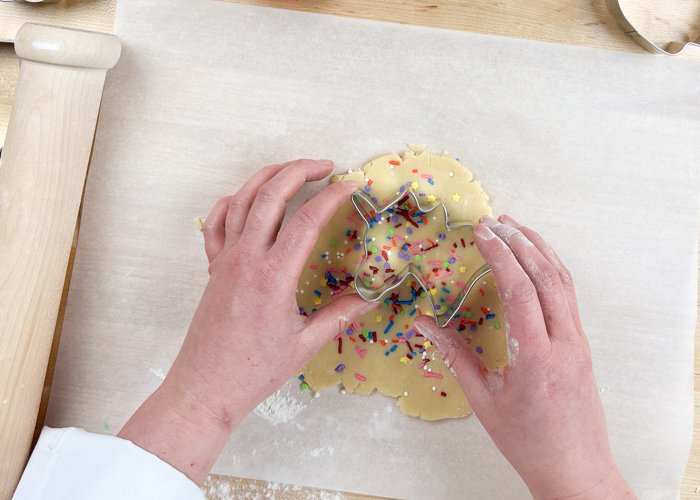 Image of Cut out your cookie shapes, and re-roll your dough out as needed.