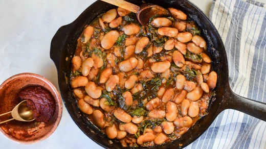 Image of Braised White Beans with Greens and Harissa