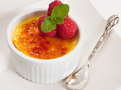 Image of Classic Crème Brûlée with  Red Currants & Strawberries