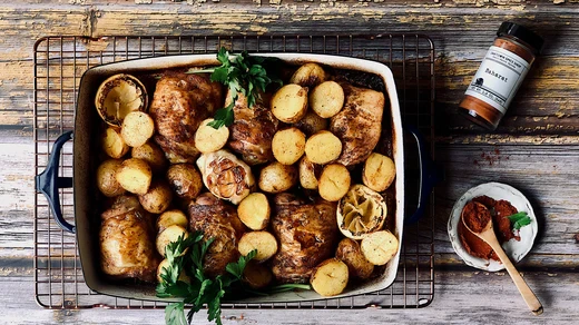 Image of Crispy Chicken Thighs and Potatoes with Baharat and Lemon