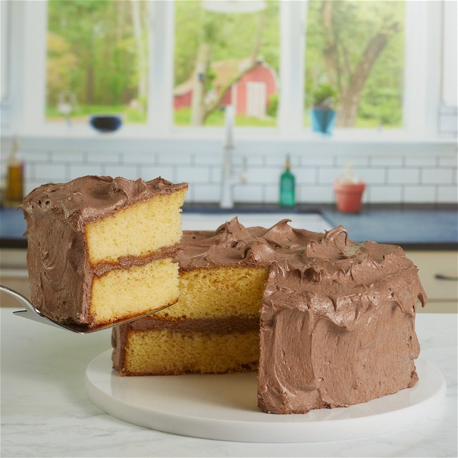 Image of Assembling & Decorating a Gourmet Yellow Cake with Chocolate Mousse Frosting