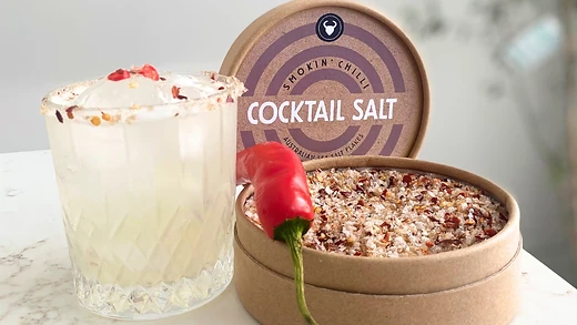 Olsson's Smokin' Chilli Cocktail Salt with a fresh Chilli and a glass of Margarita