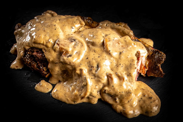 Image of Enjoy the sauce over cooked bison
steaks. Garnish with fresh thyme sprigs
(optional).