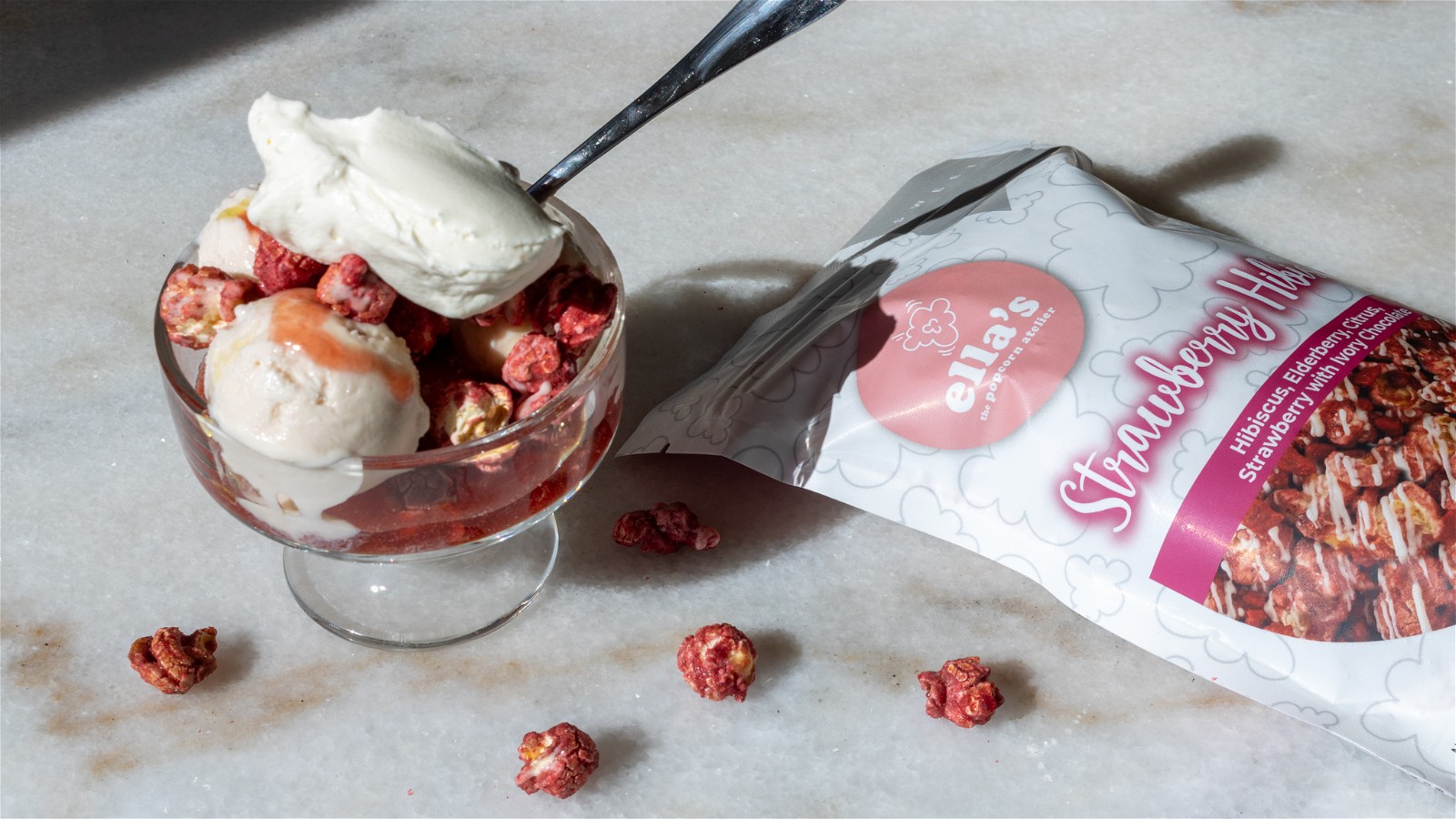 sundae on a marble table with pink popcorn