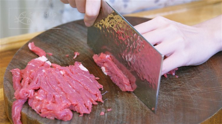 Image of Slice the beef into thin slabs, stack the slabs, and...