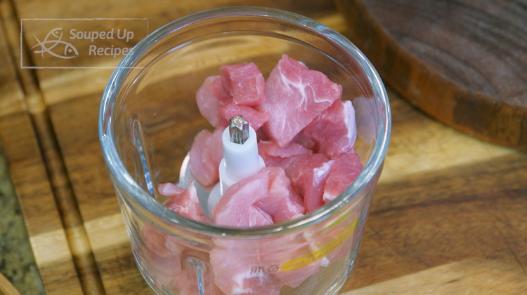 Image of Cut the pork into bite-size pieces. You can use pork loin or pork butt. Add the meat to a food processor and grind it finely. You can also buy ground pork directly so you don’t have to do this step....
