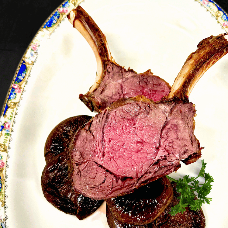 Image of Slice in between the bones (holding the bones for leverage),...