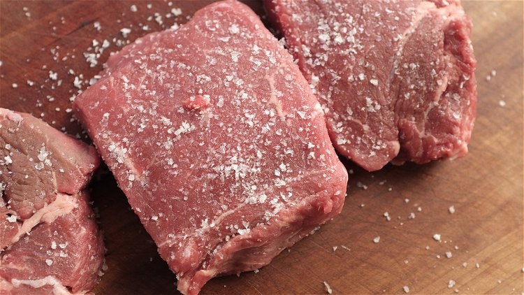 Image of To dry brine your steak, simply sprinkle kosher salt on...