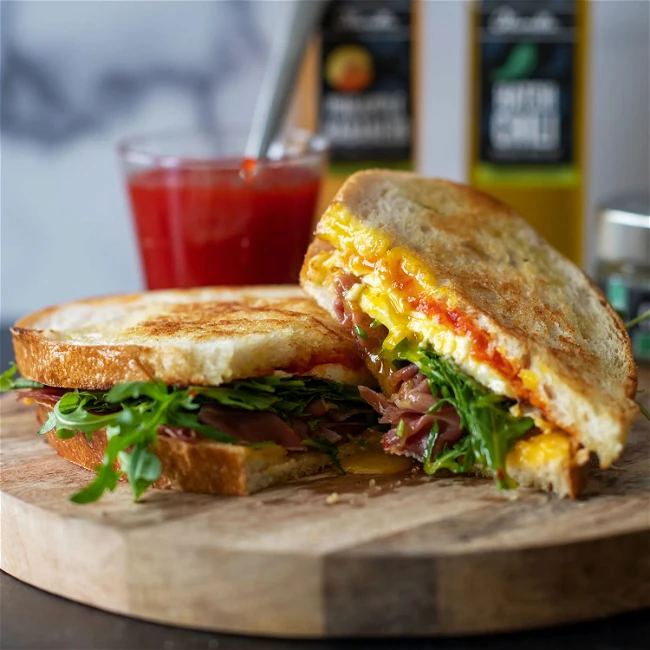 Image of Fried Egg, Prosciutto, And Red Pepper Jam Breakfast Sandwich