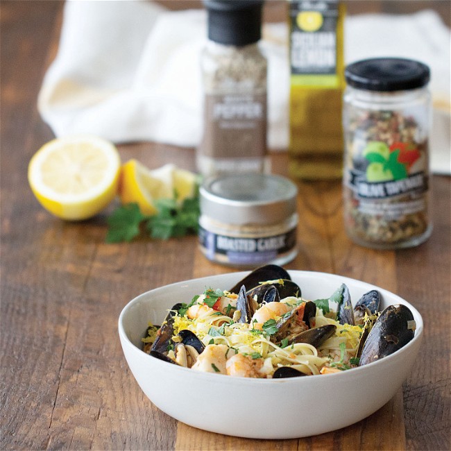 Image of Seafood Medley Pasta With Spinach And Olive Fettuccine