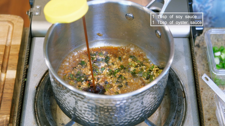 Image of Turn off the heat. Add soy sauce and oyster sauce and stir well. If you want to make this dish vegan, use vegan oyster sauce.