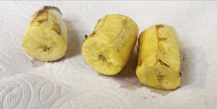 Image of Remove from oil onto a paper towel to dry