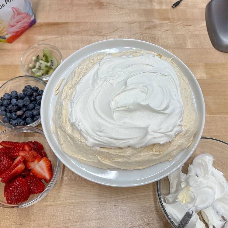 Image of Next, add a healthy helping of whipped cream.