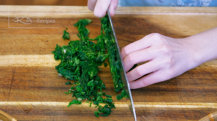 Image of If using fresh Shepherd's Purse, boil it in water for 2 minutes to remove the oxalic acid. Let it cool, squeeze out the water, and dice it finely. If using the frozen Shepherd's Purse, which is already blanched, soak it...