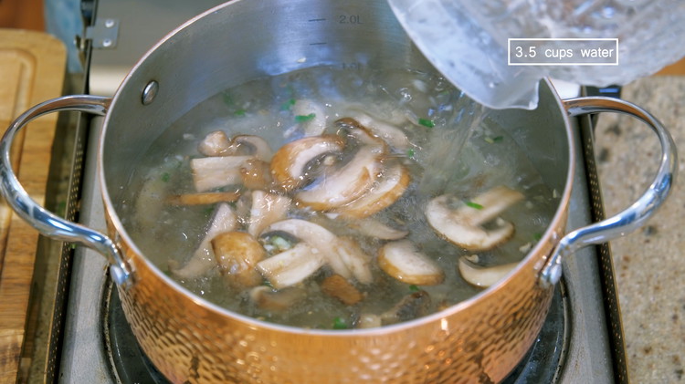 Image of Pour in 3.5 cups of water. You can also use vegetable stock. It will take 5-6 minutes to come to a boil.