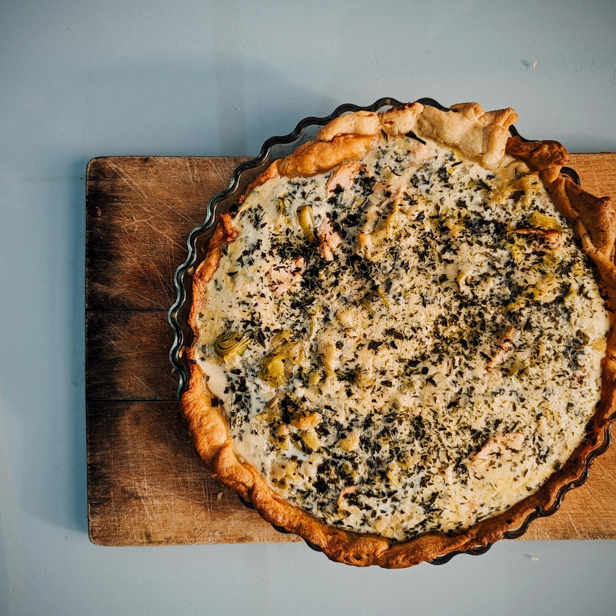 Salmon, laverbread, leek and smoked cheese quiche.