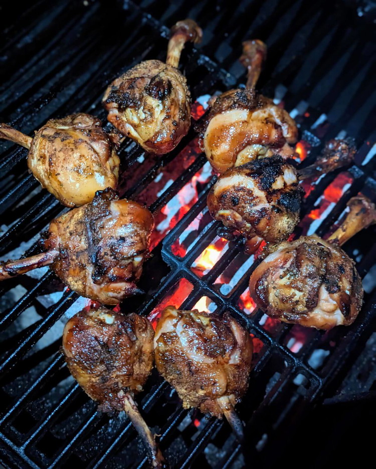 Image of Next, increase your grill to high heat and move the lollipops over the direct flame to crisp the skin on all sides.