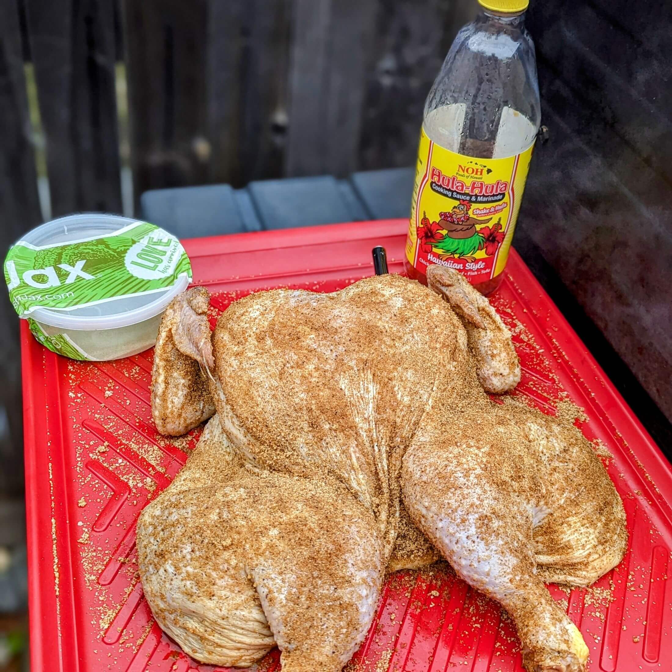 Image of Marinate the spatchcocked chicken in the huli-huli marinade in the...