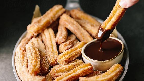 Image of Baked Churros with Chocolate Sauce