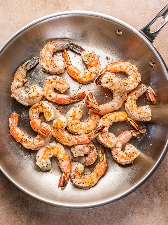 Image of Add shrimp to skillet. Sauté for 4 minutes until shrimp...