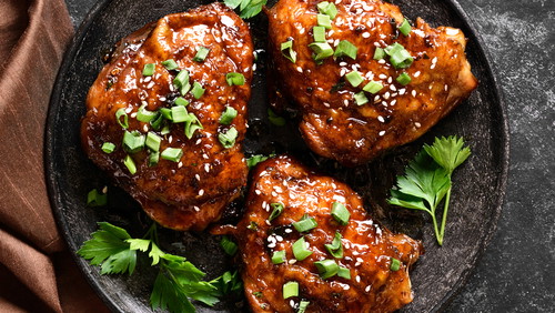 Image of Chipotle Orange Glaze Smoked Chicken Thighs