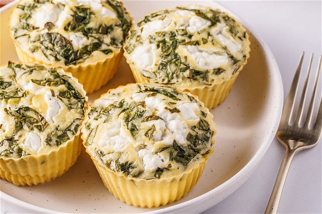 Image of Onion Butter Egg Bites with Spinach & Goat Cheese